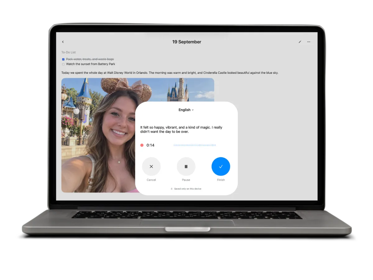 MacBook showing the voice recorder panel over a journal entry and photo, with a language picker, a live transcript, a timer, a waveform and Cancel, Pause and Finish buttons